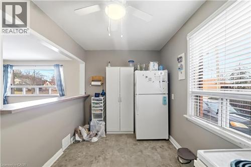 Kitchen featuring freestanding refrigerator and a ceiling fan - 776 Britannia Avenue, Hamilton, ON - Indoor