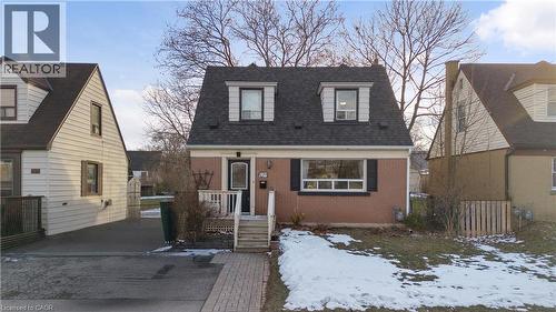 View of front facade with brick siding and roof with shingles - 776 Britannia Avenue, Hamilton, ON - Outdoor