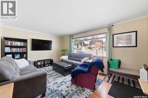 57 Murphy Crescent, Saskatoon, SK - Indoor Photo Showing Living Room With Fireplace