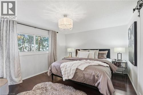 Primary Bedroom with hardwood floors - 14 Basin Crescent, Hamilton, ON - Indoor Photo Showing Bedroom