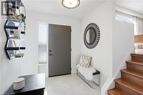 Foyer that leads off to 2pc powder room, and main floor office. - 14 Basin Crescent, Hamilton, ON - Indoor Photo Showing Other Room