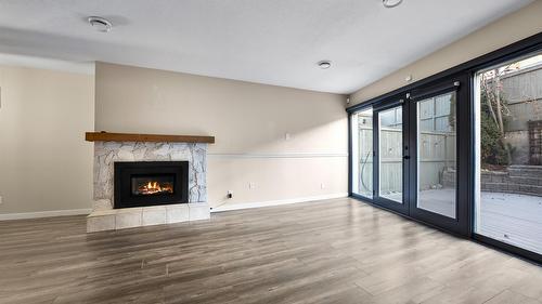 14-145 Nicola Street, Kamloops, BC - Indoor Photo Showing Other Room With Fireplace