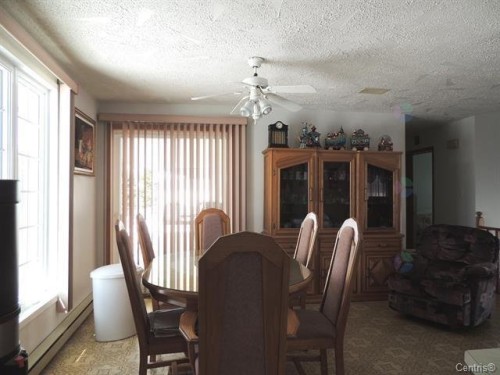 Salle à manger - 11 Rue Léonard S., Béarn, QC - Indoor Photo Showing Dining Room