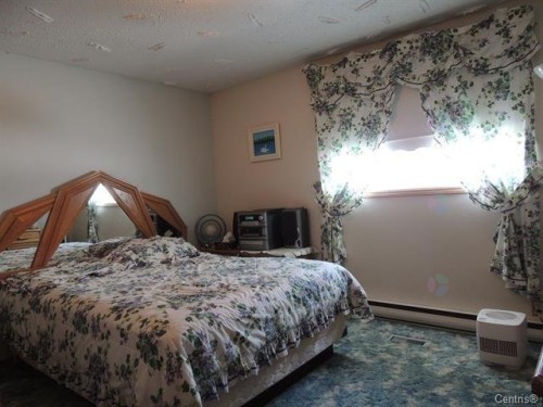 Chambre à coucher - 11 Rue Léonard S., Béarn, QC - Indoor Photo Showing Bedroom