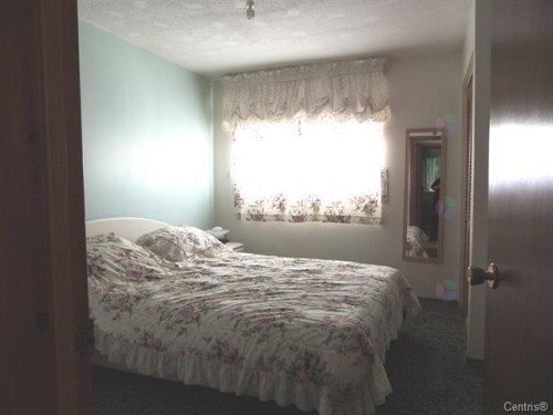 Chambre à coucher - 11 Rue Léonard S., Béarn, QC - Indoor Photo Showing Bedroom