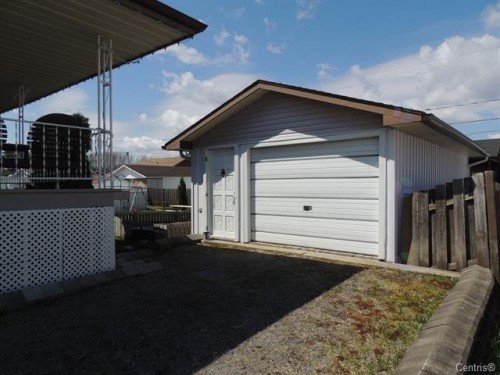 Garage - 11 Rue Léonard S., Béarn, QC - Outdoor With Exterior