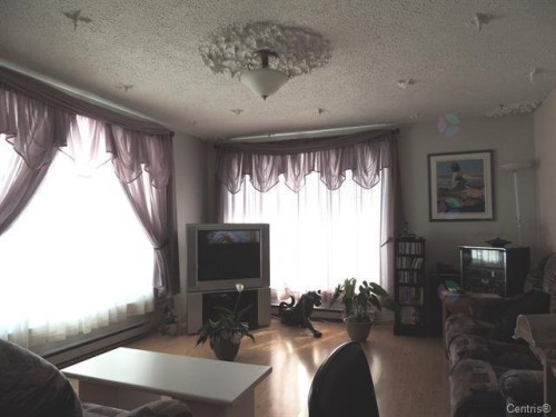 Salon - 11 Rue Léonard S., Béarn, QC - Indoor Photo Showing Living Room