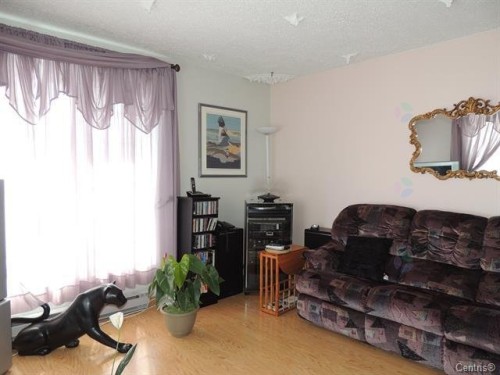 Salon - 11 Rue Léonard S., Béarn, QC - Indoor Photo Showing Living Room