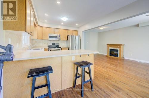 404 Tealby Crescent, Waterloo, ON - Indoor Photo Showing Kitchen With Fireplace