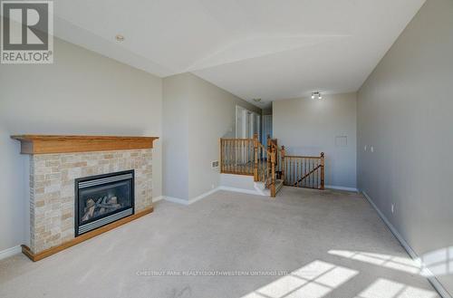 404 Tealby Crescent, Waterloo, ON - Indoor Photo Showing Living Room With Fireplace