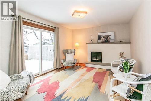 198 Ashcroft Place, Waterloo, ON - Indoor Photo Showing Living Room With Fireplace