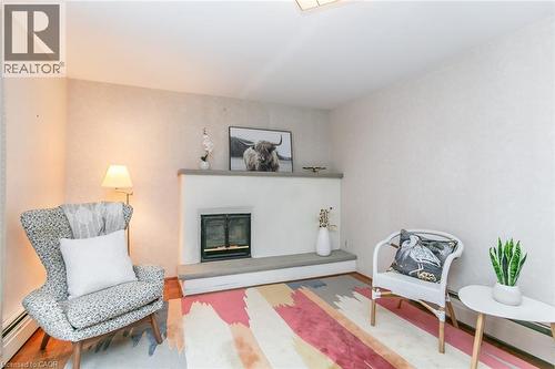198 Ashcroft Place, Waterloo, ON - Indoor Photo Showing Living Room With Fireplace
