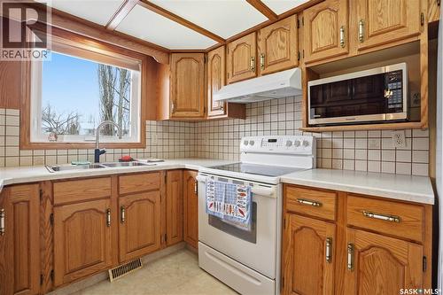 210 Brunst Crescent, Saskatoon, SK - Indoor Photo Showing Kitchen With Double Sink