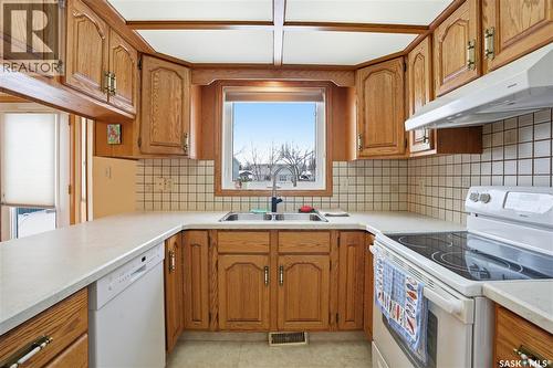 210 Brunst Crescent, Saskatoon, SK - Indoor Photo Showing Kitchen With Double Sink