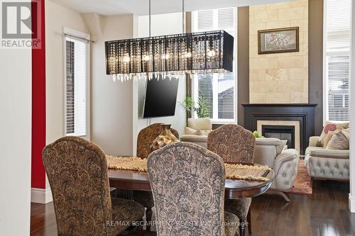 223 Annabelle Street, Hamilton, ON - Indoor Photo Showing Dining Room With Fireplace