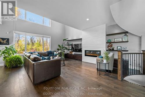 133 Arbourbrook Boulevard, Ottawa, ON - Indoor Photo Showing Living Room With Fireplace