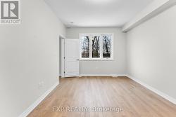 Primary suite overlooking private wooded backyard - 