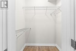 Primary walk-in closet - 