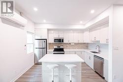 3 - 989 QUEEN STREET E  Toronto, ON M4M 1K2