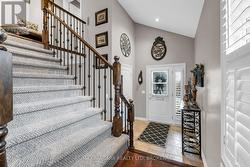 Stairway to private primary bedroom suite - 