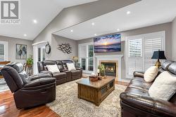 Main floor living room with gas fireplace - 