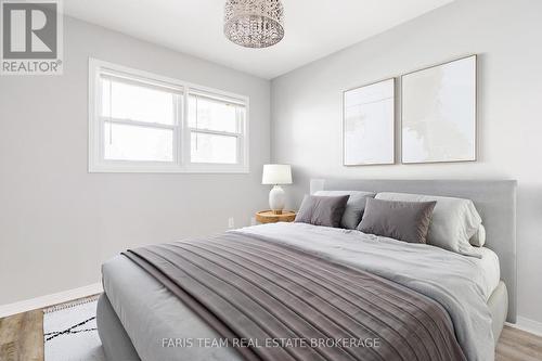 Virtually Staged - 34 - 120 D'Ambrosio Drive, Barrie, ON - Indoor Photo Showing Bedroom