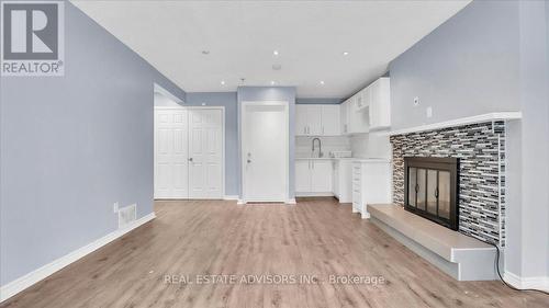 62 Histon Crescent, Brampton, ON - Indoor Photo Showing Other Room With Fireplace