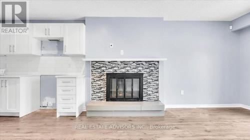 62 Histon Crescent, Brampton, ON - Indoor Photo Showing Living Room With Fireplace