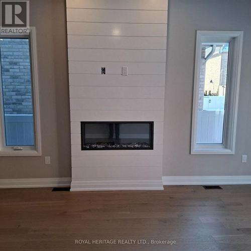 8 St Augustine Drive, Whitby, ON - Indoor With Fireplace