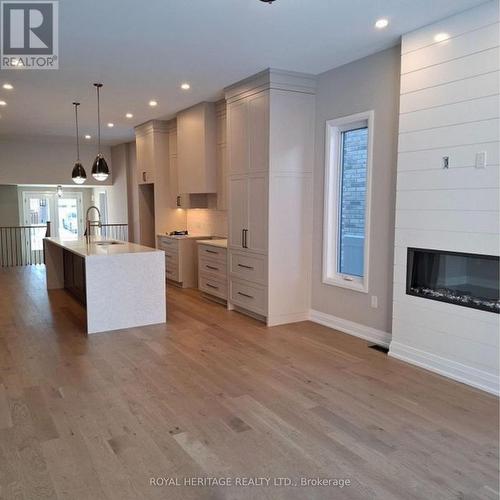 8 St Augustine Drive, Whitby, ON - Indoor With Fireplace