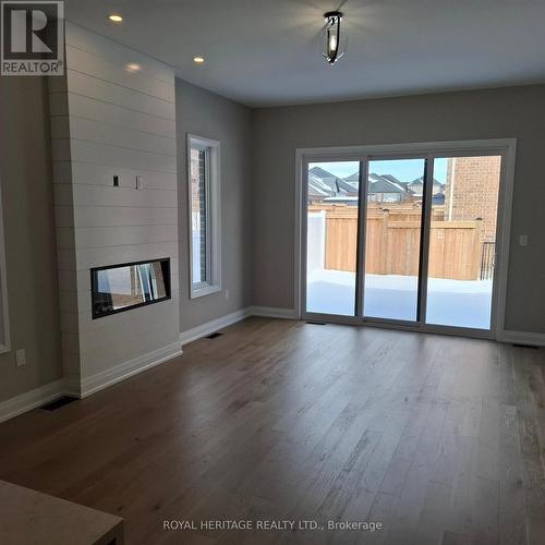 8 St Augustine Drive, Whitby, ON - Indoor Photo Showing Other Room With Fireplace