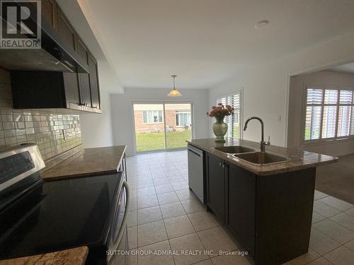 10 Beatty Avenue, Thorold, ON - Indoor Photo Showing Kitchen With Double Sink