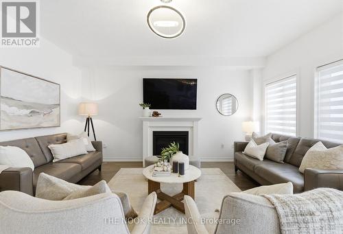 141 Lyle Drive, Clarington (Bowmanville), ON - Indoor Photo Showing Living Room With Fireplace