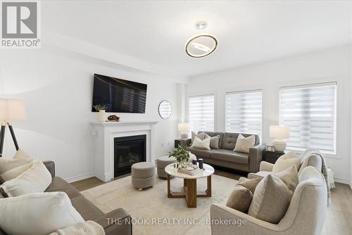 141 Lyle Drive, Clarington (Bowmanville), ON - Indoor Photo Showing Living Room With Fireplace