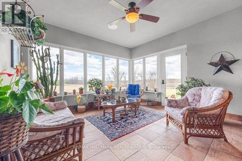 Bright Sunroom overlooking Backyard - 6980 Mansfield Road, Ottawa, ON - Indoor Photo Showing Living Room
