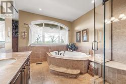 Ensuite with large Soaker Tub and Glass Shower - 