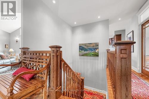 Open Oak Stairs leading into Lower Level - 6980 Mansfield Road, Ottawa, ON - Indoor Photo Showing Other Room