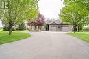 Wide Wrap Around Driveway with 3 Car Garage - 6980 Mansfield Road, Ottawa, ON  - Outdoor 