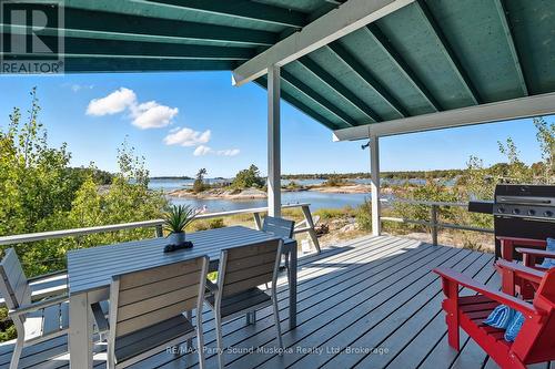 15 Forsyths Road, Carling, ON - Outdoor With Body Of Water With Deck Patio Veranda With Exterior