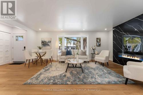 1796 Saunderson Drive, Ottawa, ON - Indoor Photo Showing Living Room With Fireplace