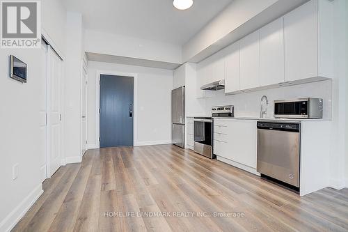 215 - 3200 William Coltson Avenue, Oakville, ON - Indoor Photo Showing Kitchen With Stainless Steel Kitchen