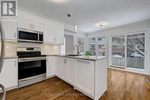 RENOVATED KITCHEN - 2177 Lenester Avenue, Ottawa, ON - Indoor Photo Showing Kitchen With Upgraded Kitchen
