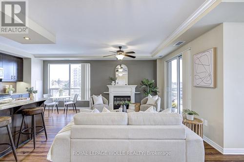 608 - 539 Belmont Avenue W, Kitchener, ON - Indoor Photo Showing Other Room With Fireplace