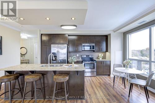 608 - 539 Belmont Avenue W, Kitchener, ON - Indoor Photo Showing Kitchen With Stainless Steel Kitchen With Double Sink With Upgraded Kitchen