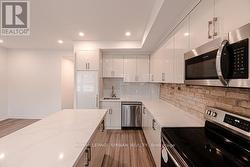 3 - 991 QUEEN STREET E  Toronto, ON M4M 1K2