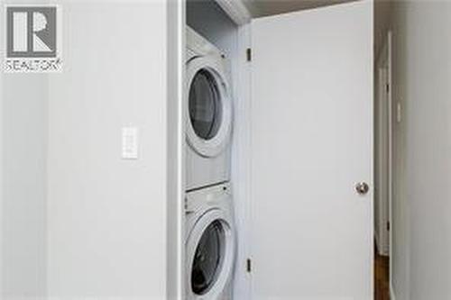 photos was taken prior to tenants moving in - 130 Dysart Road, Kelowna, BC - Indoor Photo Showing Laundry Room