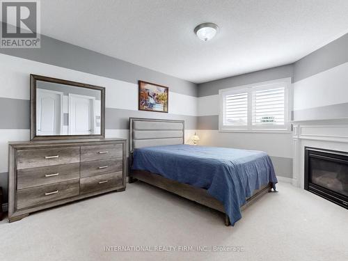 Prime bedroom with 4 pcs ensuite and walk in close - 110 Swenson Street, New Tecumseth, ON - Indoor Photo Showing Bedroom