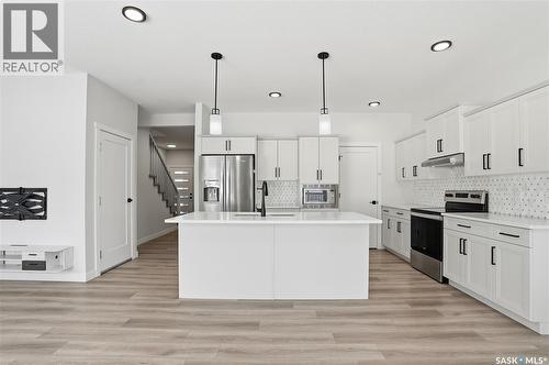 134 Chelsom Bend, Saskatoon, SK - Indoor Photo Showing Kitchen With Upgraded Kitchen