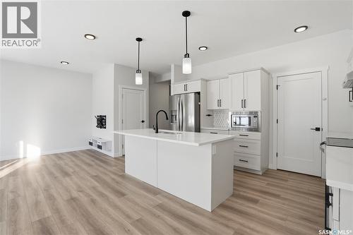 134 Chelsom Bend, Saskatoon, SK - Indoor Photo Showing Kitchen With Upgraded Kitchen