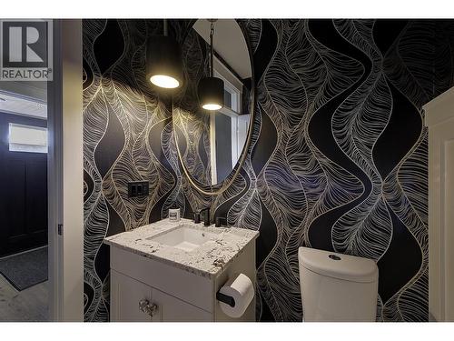 Bathroom near front entrance - 5499 Mountainside Drive, Kelowna, BC - Indoor Photo Showing Bathroom